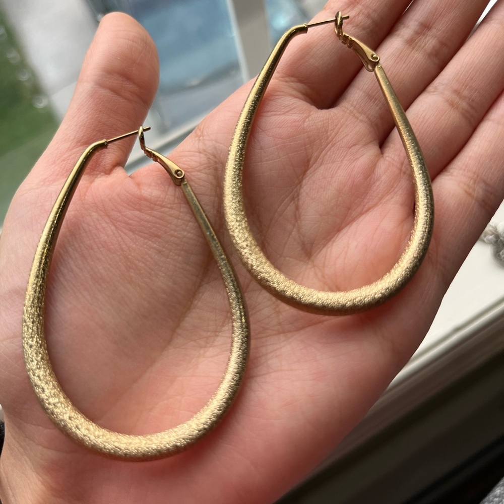 Brand new bohemian style gold
plated earrings